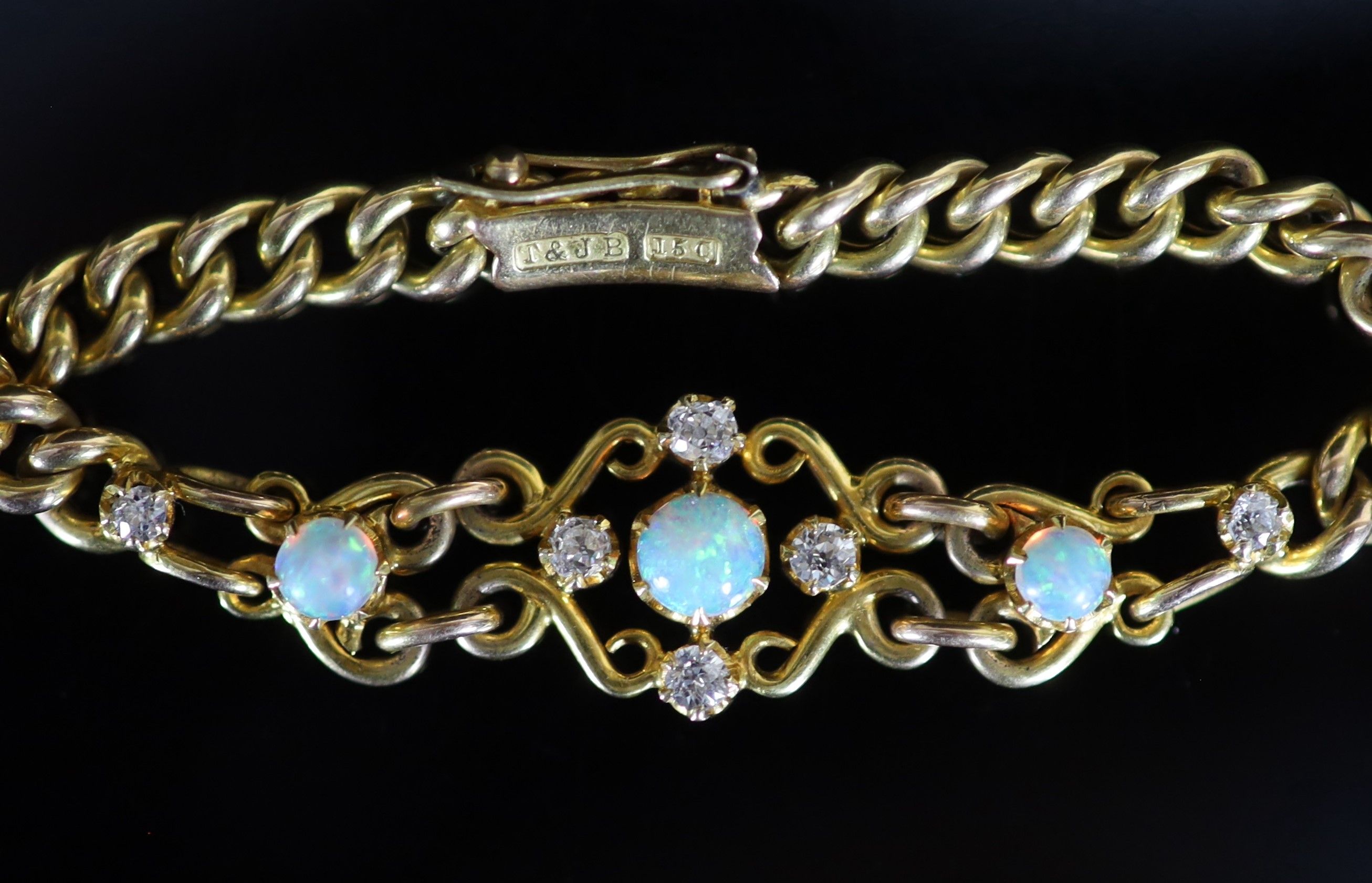 An early 20th century 15ct gold white opal and diamond set curblink bracelet